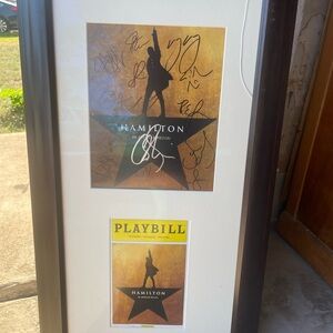 Hamilton signed by cast poster and playbook